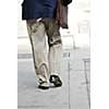 Businessman walking on a busy street downtown