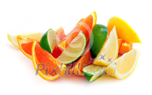 Wedges of assorted citrus fruits isolated on white background