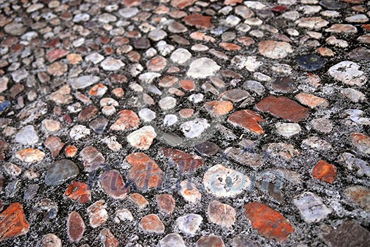 Abstract background of old medieval cobblestone pavement Abstract background of old medieval cobblestone pavement