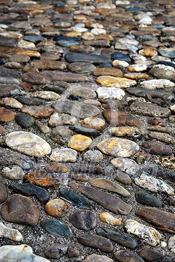 Abstract background of old medieval cobblestone pavement Abstract background of old medieval cobblestone pavement