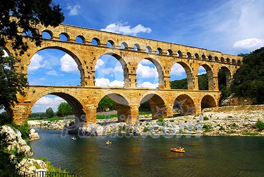 Pont du Gard is a part of Roman aqueduct in southern France near Nimes. Pont du Gard is a part of Roman aqueduct in southern France near Nimes.