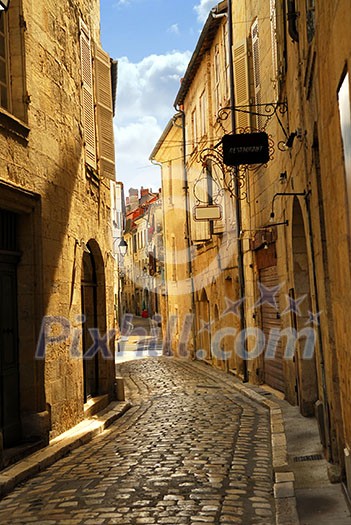 Narrow medieval street in town of Perigueux, Perigord, France Narrow medieval street in town of Perigueux, Perigord, France