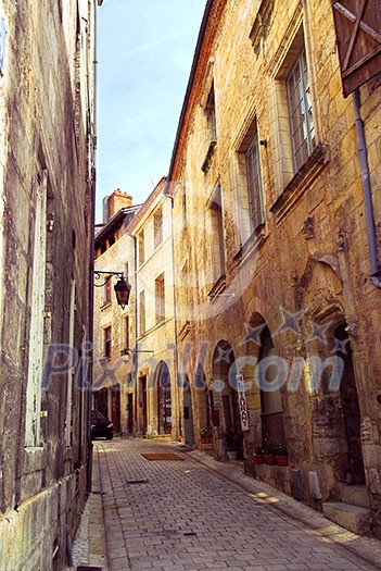 Narrow medieval street in town of Perigueux, Perigord, France Narrow medieval street in town of Perigueux, Perigord, France