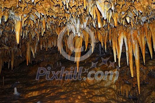 Rock formations inside of a cave in Dordogne region, France Rock formations inside of a cave in Dordogne region, France