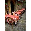 Outdoor restaurant patio on the street of Sarlat, Dordogne region, France