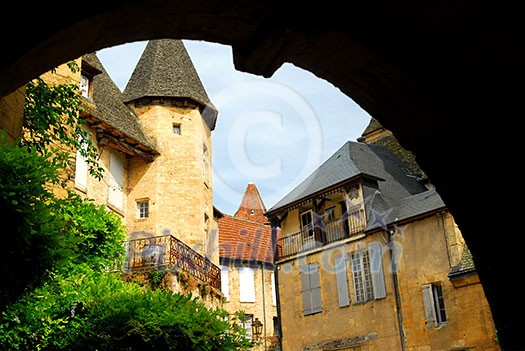 View from the arch in medieval town of Sarlat, France View from the arch in medieval town of Sarlat, France