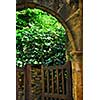 Garden gate in medieval town of Sarlat, Dordogne region, France