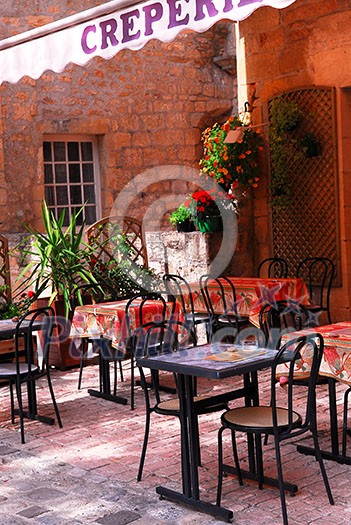 Restaurant patio in medieval town of Sarlat, France Restaurant patio in medieval town of Sarlat, France