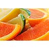 Wedges of assorted citrus fruits lemon orange and lime