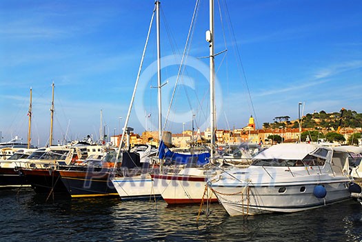 Luxury boats at the dock in St. Tropez in French Riviera Luxury boats at the dock in St. Tropez in French Riviera