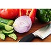 Fresh garden vegetables on cutting board - ingredients for a salad