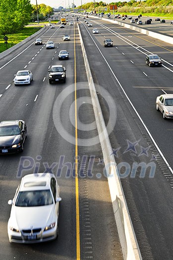 Busy multi-lane highway in a big city Busy multi-lane highway in a big city