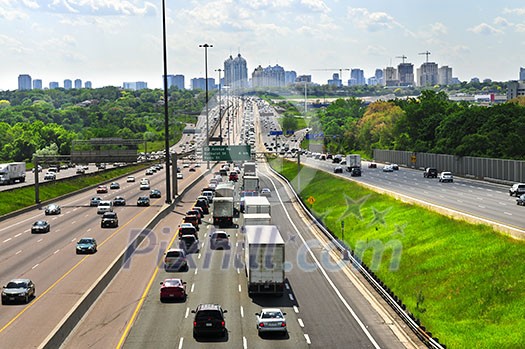 Busy multi-lane highway in a big city Busy multi-lane highway in a big city