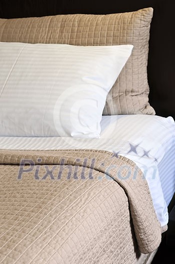 Comfortable bed in upscale hotel close up Comfortable bed in upscale hotel close up