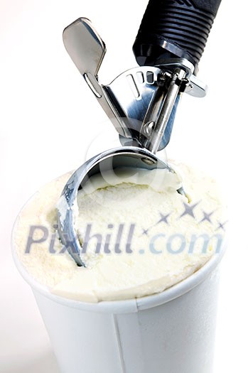Tub of vanilla ice cream with a scoop on white background Tub of vanilla ice cream with a scoop on white background