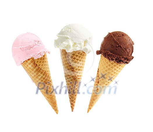 Assorted ice cream in sugar cones isolated on white background