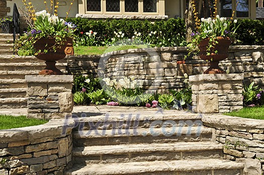 Natural stone landscaping in front of a house Natural stone landscaping in front of a house