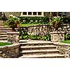 Natural stone landscaping in front of a house