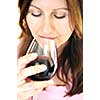 Mature woman holding a glass of red wine