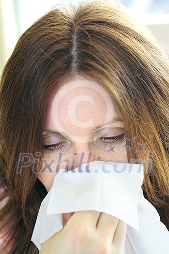 Mature woman with a flu or an allergy symptoms Mature woman with a flu or an allergy symptoms