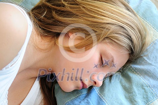 Beautiful teenage girl sleeping in the morning
