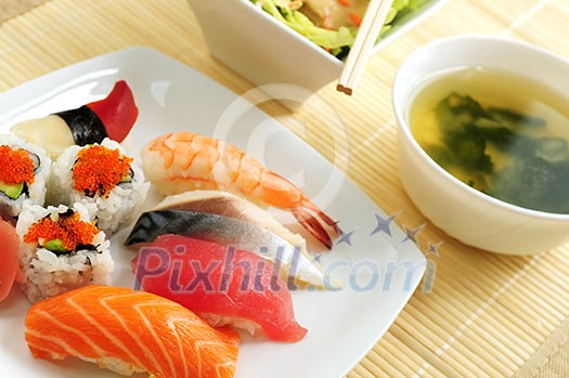 Sushi lunch with miso soup and green salad Sushi lunch with miso soup and green salad