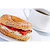 Light meal of smoked salmon bagel and coffee