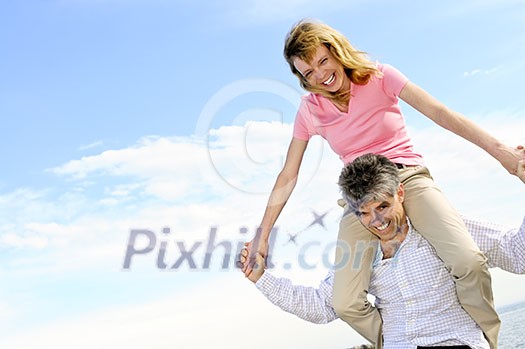 Mature romantic couple of baby boomers enjoying outdoors