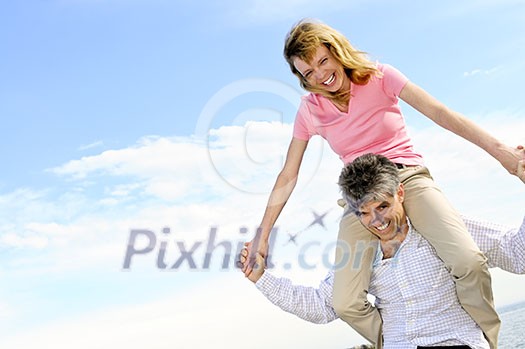 Mature romantic couple of baby boomers enjoying outdoors Mature romantic couple of baby boomers enjoying outdoors