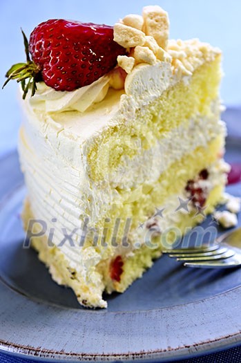 Slice of strawberry meringue cake on a plate