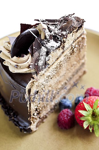 Slice of chocolate mousse cake served on a plate