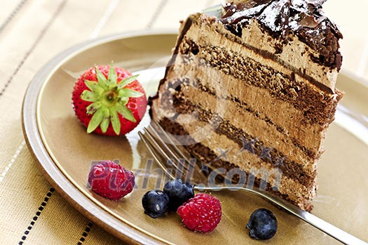 Slice of chocolate mousse cake served on a plate