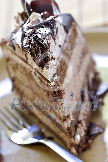 Slice of chocolate mousse cake served on a plate Slice of chocolate mousse cake served on a plate