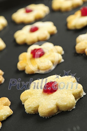 Fresh shortbread cookies on a baking tray
