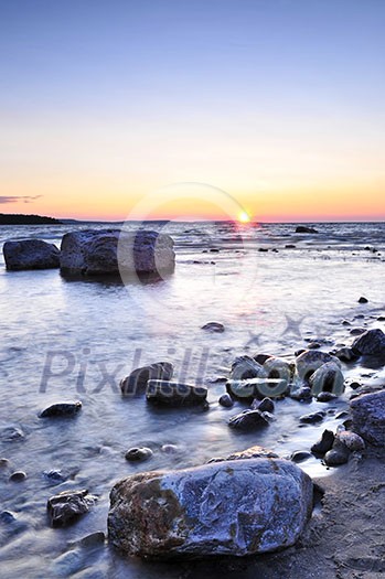Sunset at the rocky shore of Georgian Bay, Canada. Awenda provincial park. Sunset at the rocky shore of Georgian Bay, Canada. Awenda provincial park.
