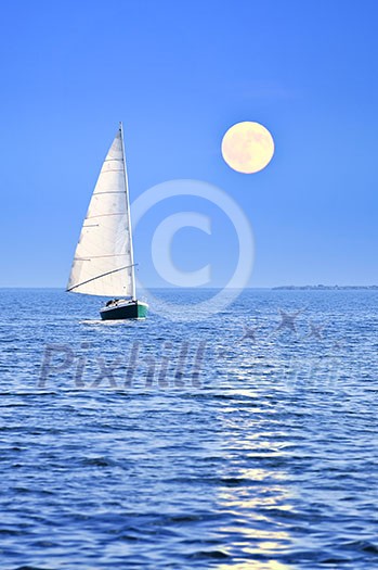 Sailboat sailing in a sea at full moon night Sailboat sailing in a sea at full moon night