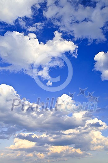 Background of blue sky with white cumulus clouds Background of blue sky with white cumulus clouds