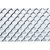 Pattern of chain link fence under fresh snow