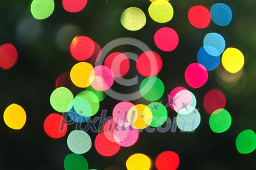Out of focus multicolored Christmas light background