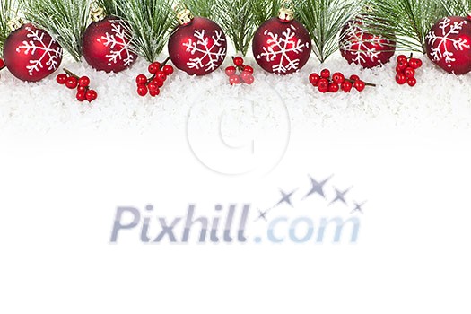 Christmas border with red ornaments and pine branches