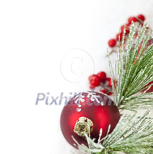 Red Christmas decoration with pine needles with copy space Red Christmas decoration with pine needles with copy space