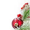 Red Christmas decoration with pine needles with copy space