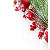 Red Christmas decorations with pine branches with copy space