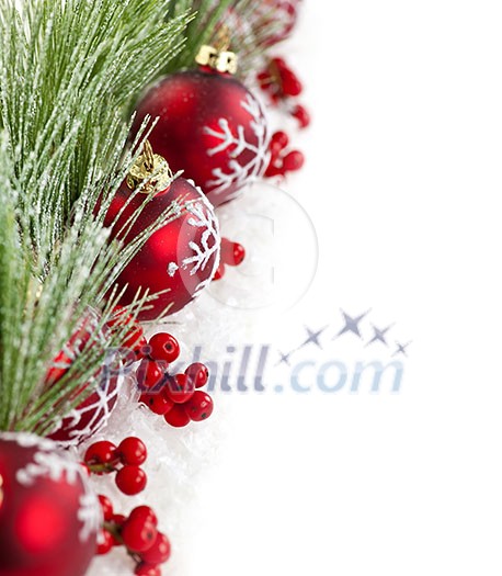Red Christmas decorations with pine branches with copy space