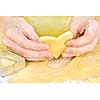 Making heart shaped shortbread cookies with cutters