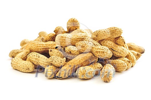 Closeup on pile of peanuts with shells Closeup on pile of peanuts with shells