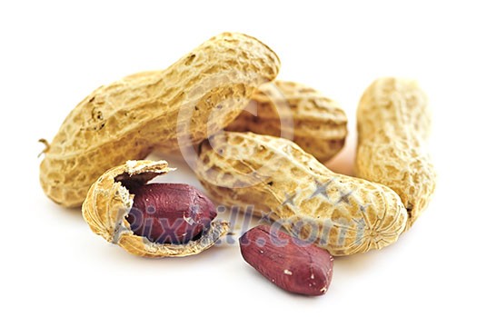 Closeup of peanuts with and without shells Closeup of peanuts with and without shells