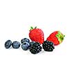 Closeup of assorted fresh berries isolated on white background