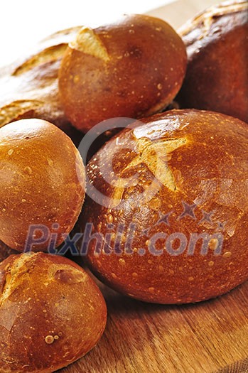 Small and large round loaves of sourdough bread Small and large round loaves of sourdough bread
