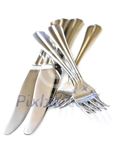 Forks and knifes isolated on white background Forks and knifes isolated on white background